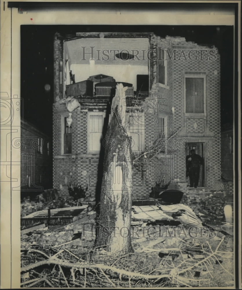 1962, Albert Horn stands in doorstep of Chicago home after tornado - Historic Images