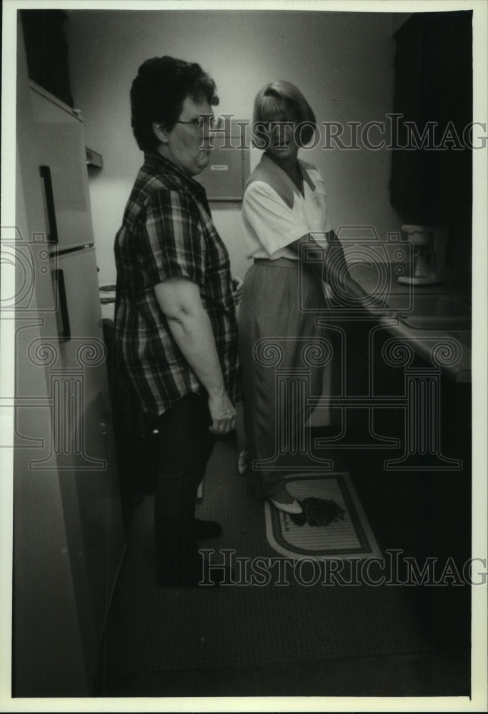1993, Transitional Living Services&#39; Deb Ligas, shows apartment - Historic Images