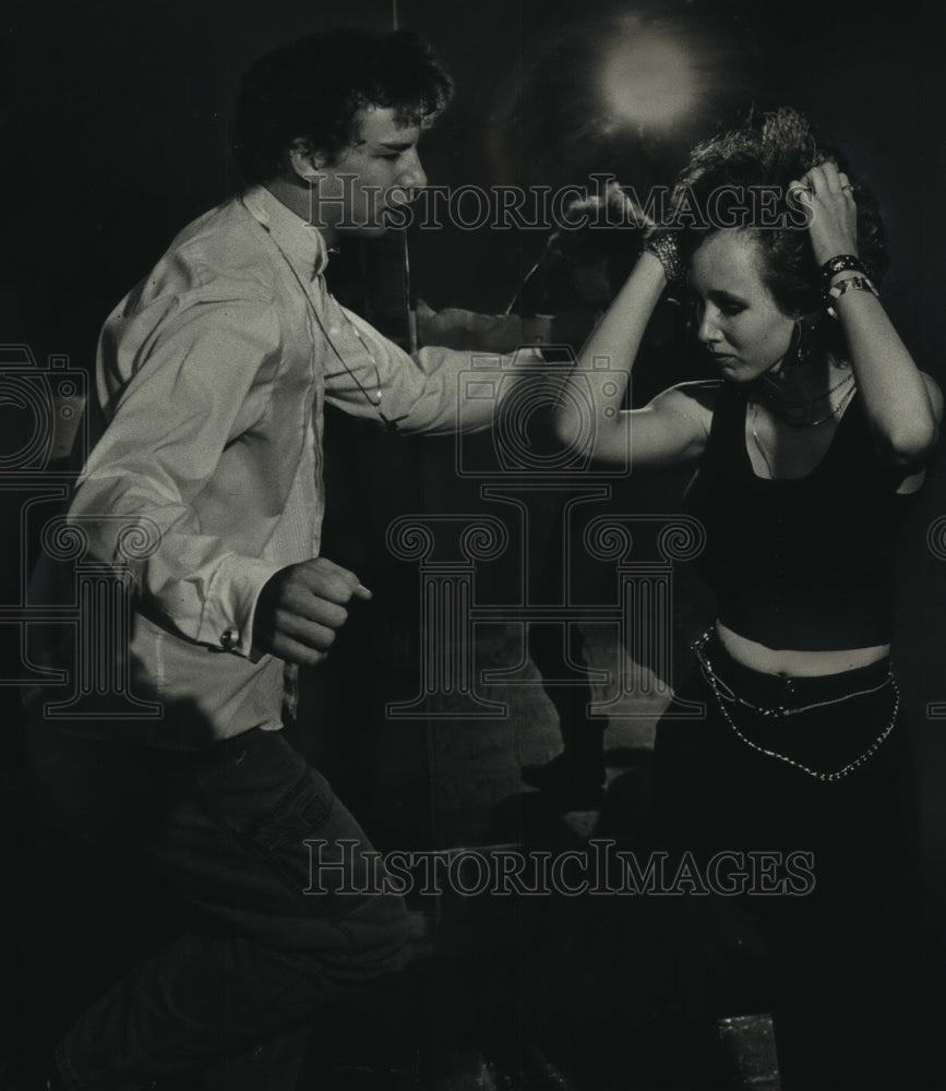 1988, A teenage couple dancing at Bailey&#39;s in Milwaukee. - mjc06014 - Historic Images