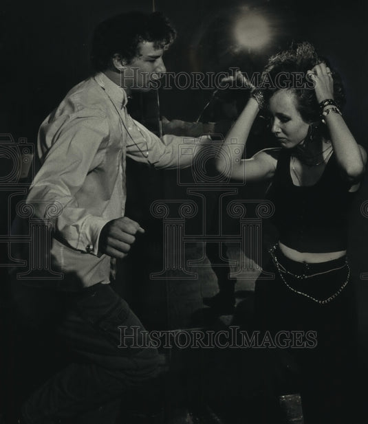 1988, A teenage couple dancing at Bailey's in Milwaukee. - mjc06014 - Historic Images