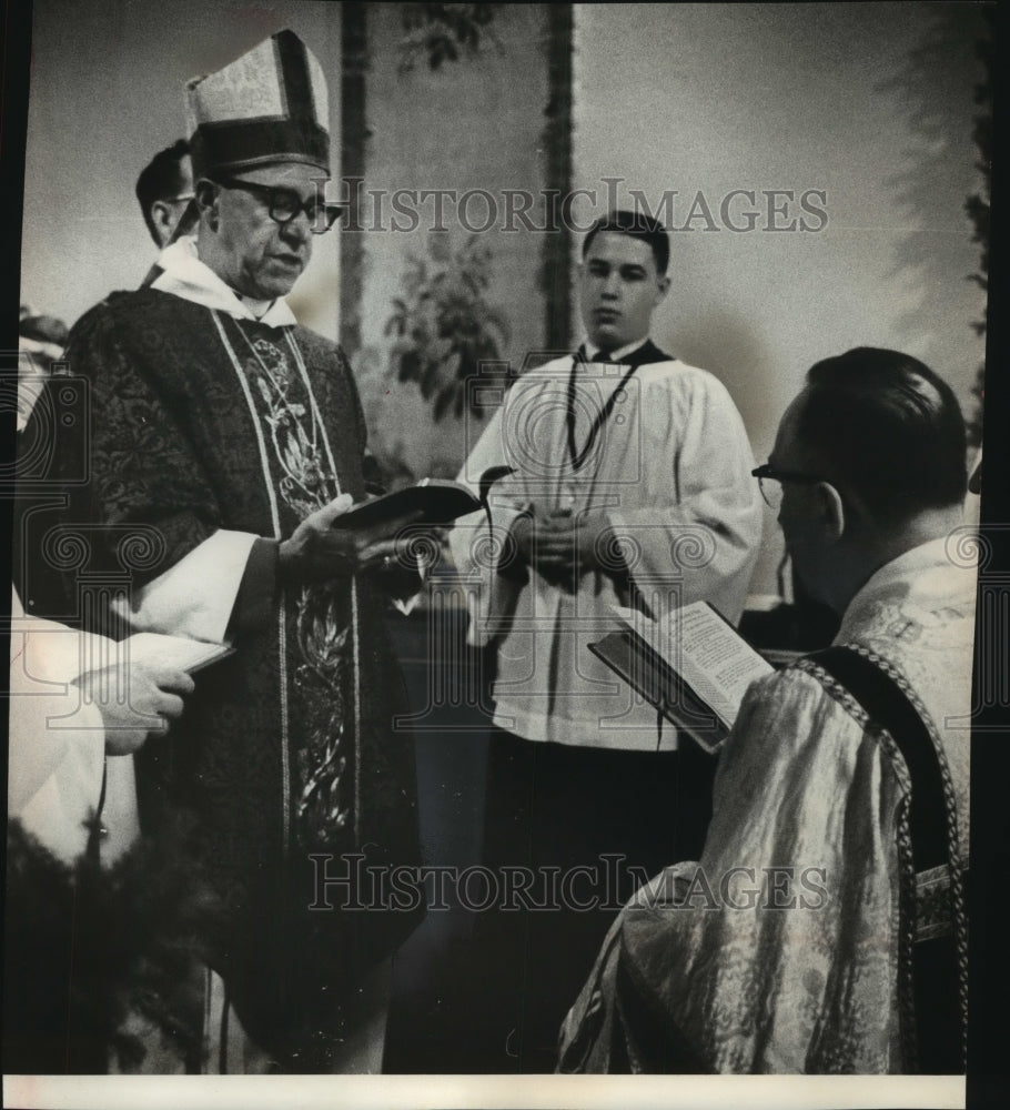 1965, Father and son present at C. Jack Faas ordained a minister - Historic Images