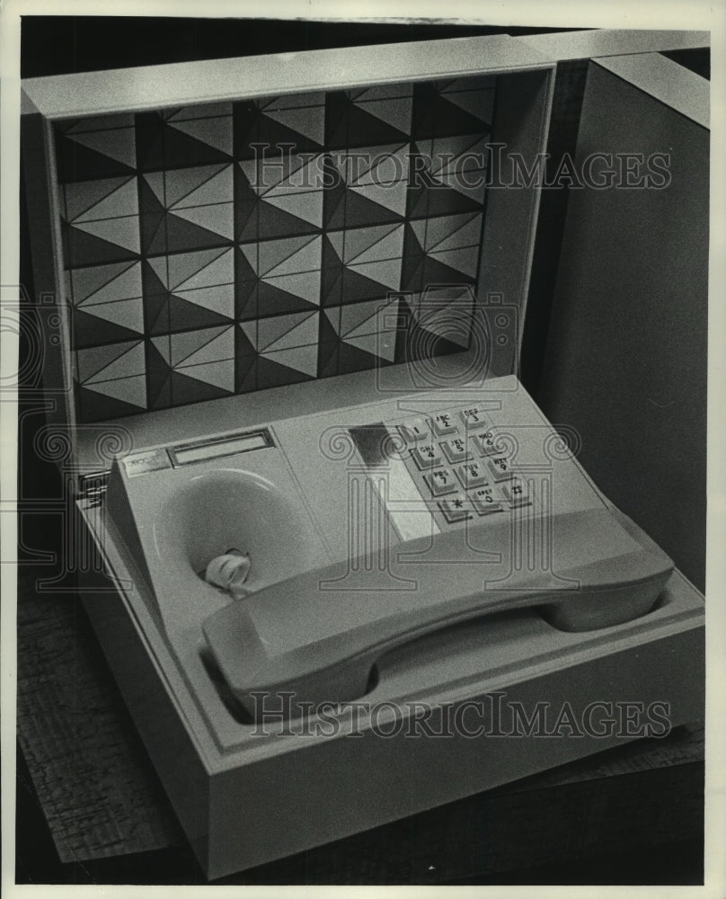1977 Push button telephone in its own case - Historic Images