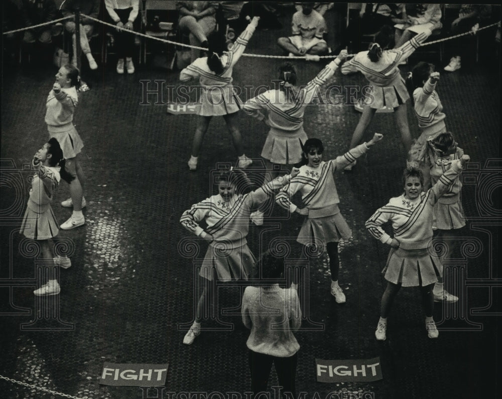 1988 St. Pius XI frosh cheerleaders win first place at competition - Historic Images