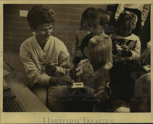 1989, Cashier Prepares to Scan Student's Computer-Coded Lunch - Historic Images