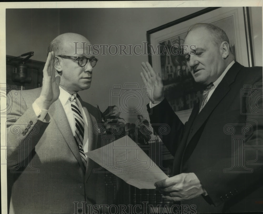 1956 Press Photo Judge Herbert J. Steffes sworn in by Roland J. Steinle-Historic Images