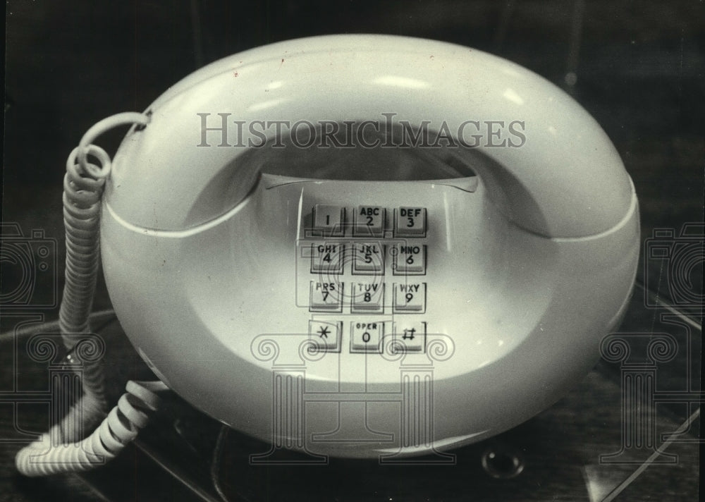 1980, Wisconsin Telephone Company unveils a new modern telephone - Historic Images