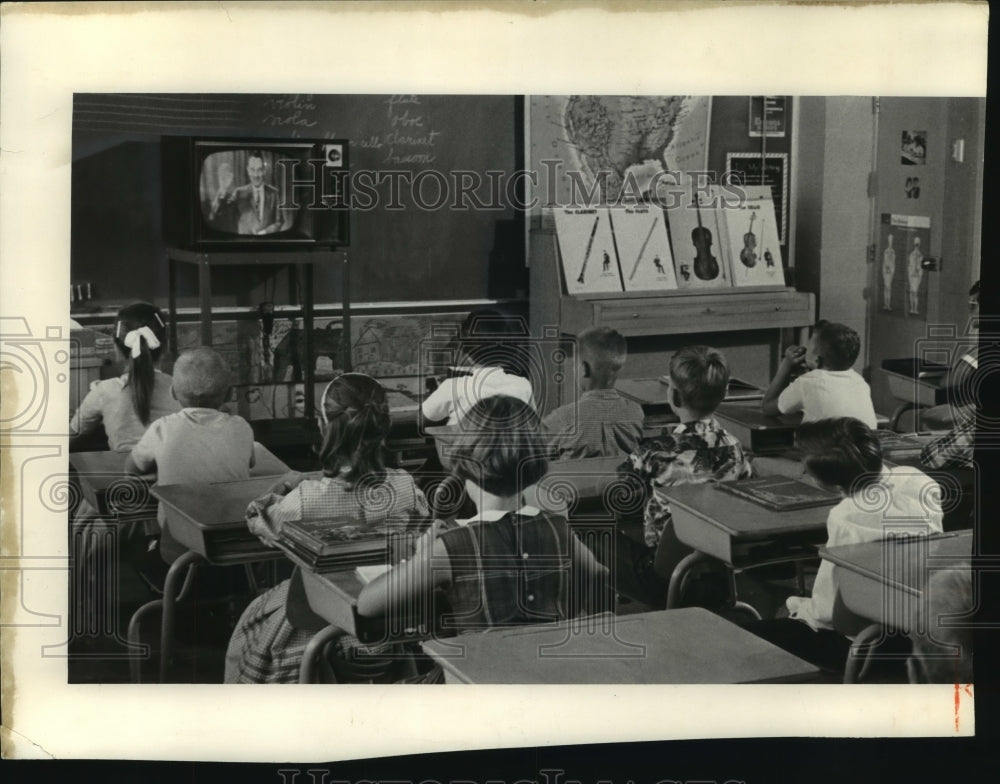 1961, Fourth and Fifth graders learning Spanish via television - Historic Images