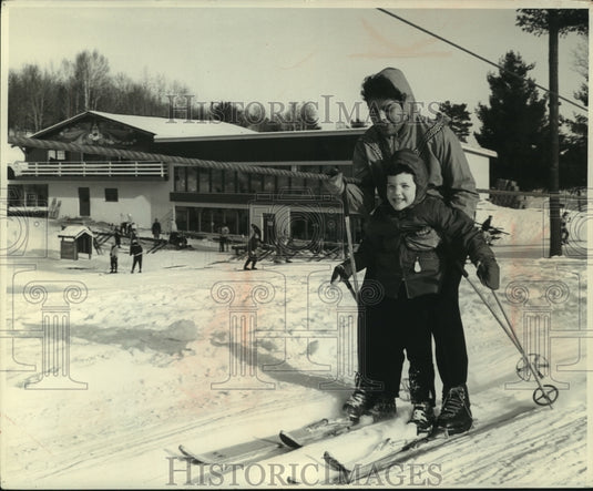 1962, Chippewa Indian Patsy Mike gives Frances Wise ride up rope tow - Historic Images
