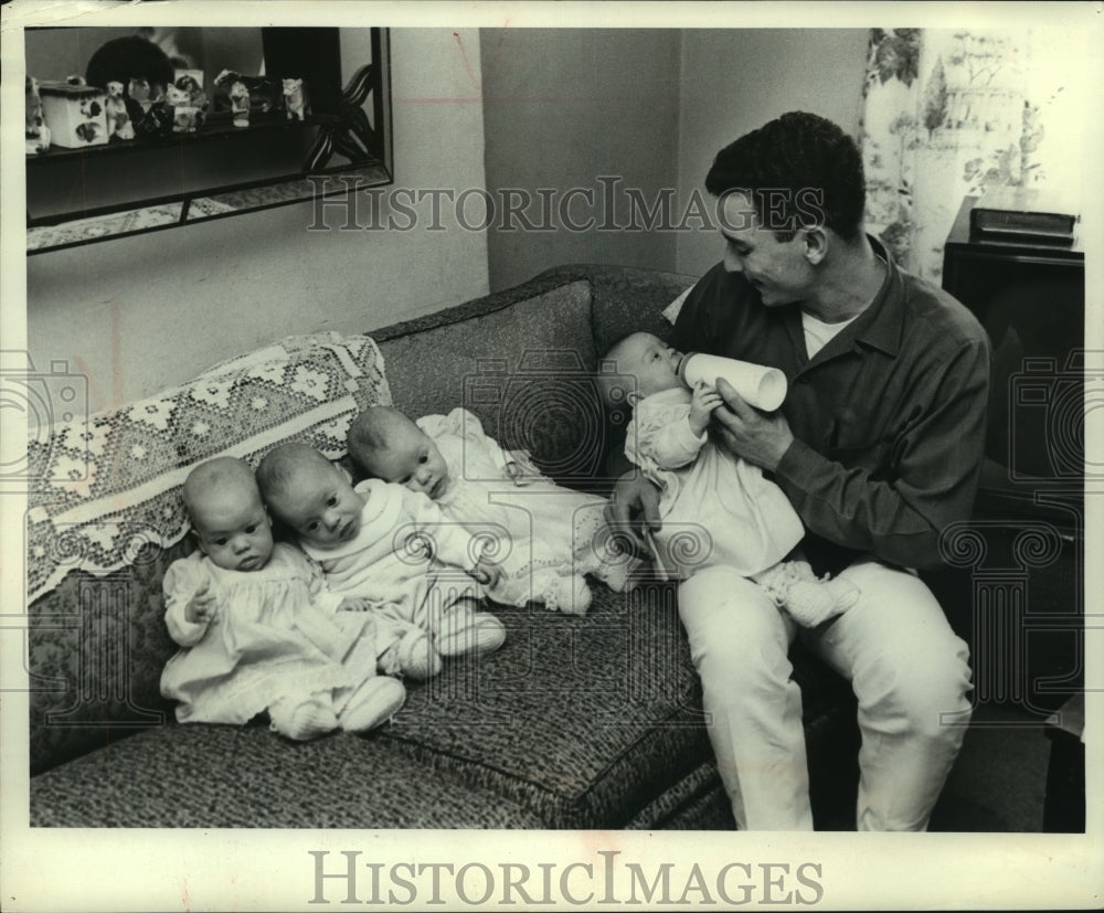 1965 Press Photo 150 bottles a week to feed the Reyes quadruplets in Baltimore-Historic Images