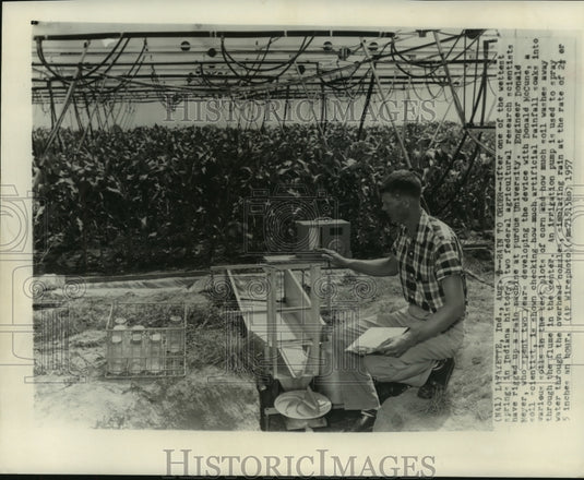 1957 Press Photo Engineer rigs up a rain machine at Purdue University, Indiana - Historic Images