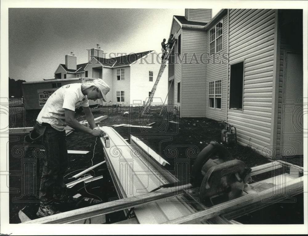 1990, Dave Czeszy at Thiensville, Wisconsin construction site - Historic Images