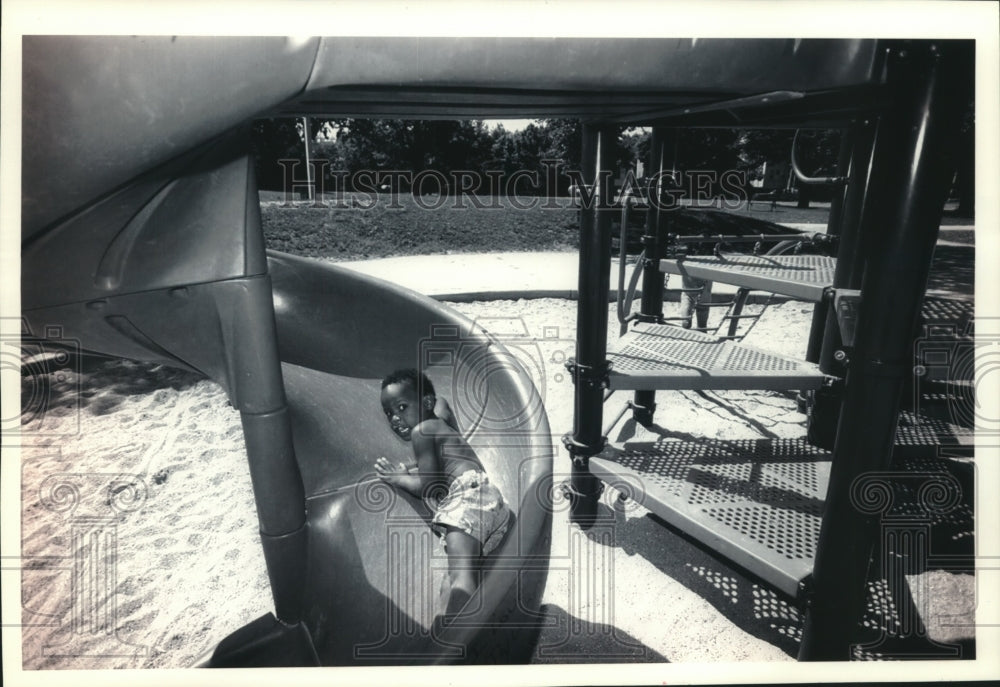 1992 Press Photo Little John Bruce enjoys play area at Tiefenthaler Park - Historic Images