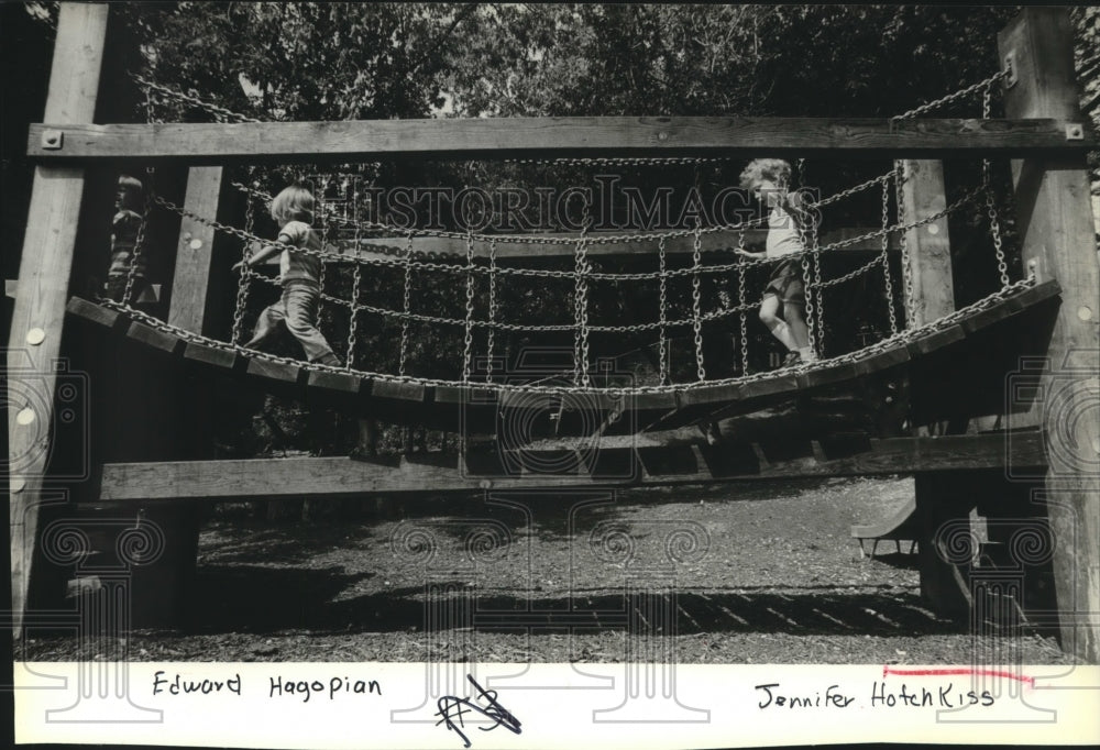 1980 Edward Hagopian and Jennifer Hotchkiss on a playground - Historic Images