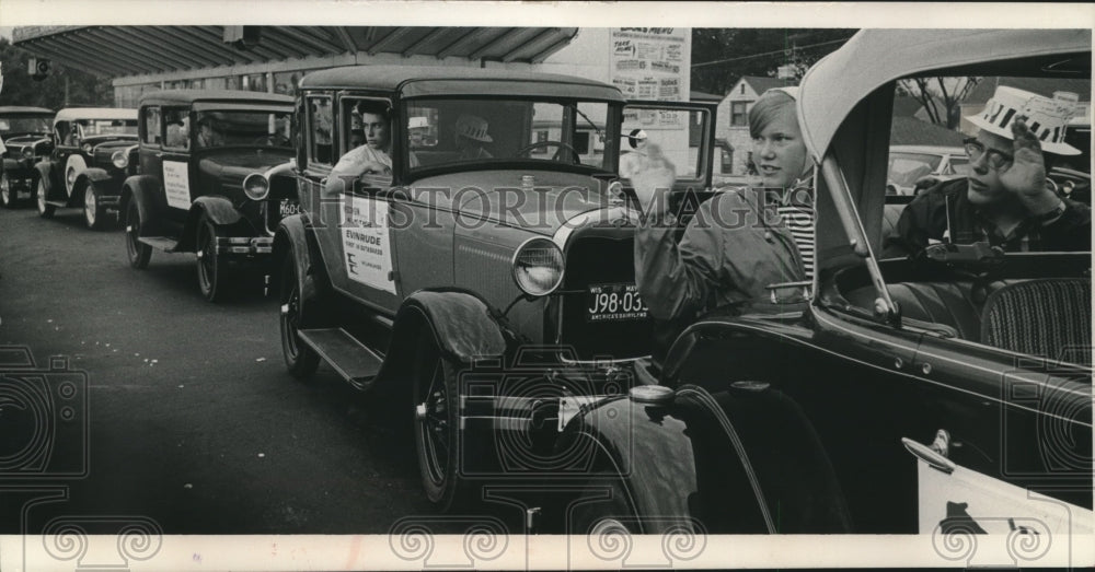 1966 Press Photo Cheryl Koser &amp; her brother Gary wave from a model A Ford. - Historic Images