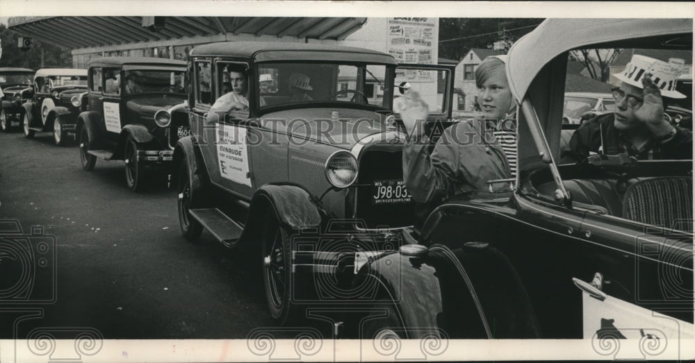 1966 Press Photo Cheryl Koser & her brother Gary wave from a model A Ford. - Historic Images