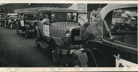 1966 Press Photo Cheryl Koser & her brother Gary wave from a model A Ford. - Historic Images