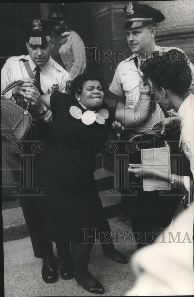 1966, Mrs. Mabel Turner wrestled with police officers at city hall - Historic Images