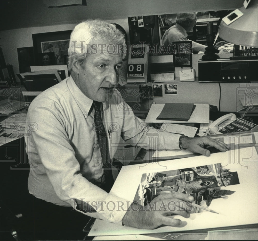 1985 Press Photo Artist Verne Thieme of Brookfield, Wisconsin, at his desk - Historic Images