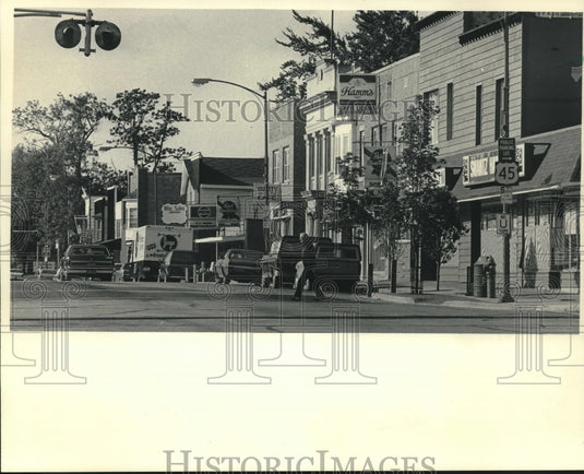 1985, Buildings line Main St. in downtown Union Grove, Wisconsin - Historic Images