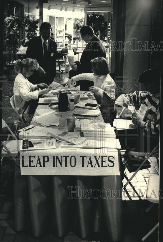 1988, Eve Sappenfield helped Christine Fowler with taxes, Milwaukee - Historic Images