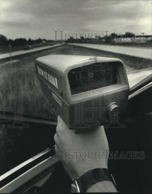 1988, Police use hand held radar gun in Grafton, Wisconsin - Historic Images