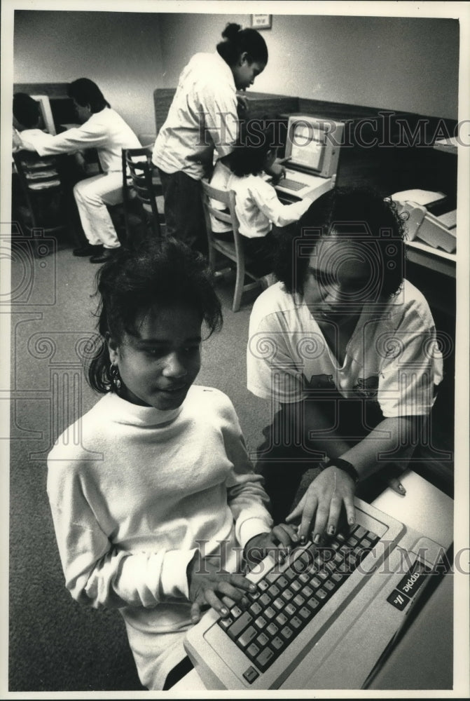 1992, Jackie Sanchez learns computer skills, United Community Centers - Historic Images