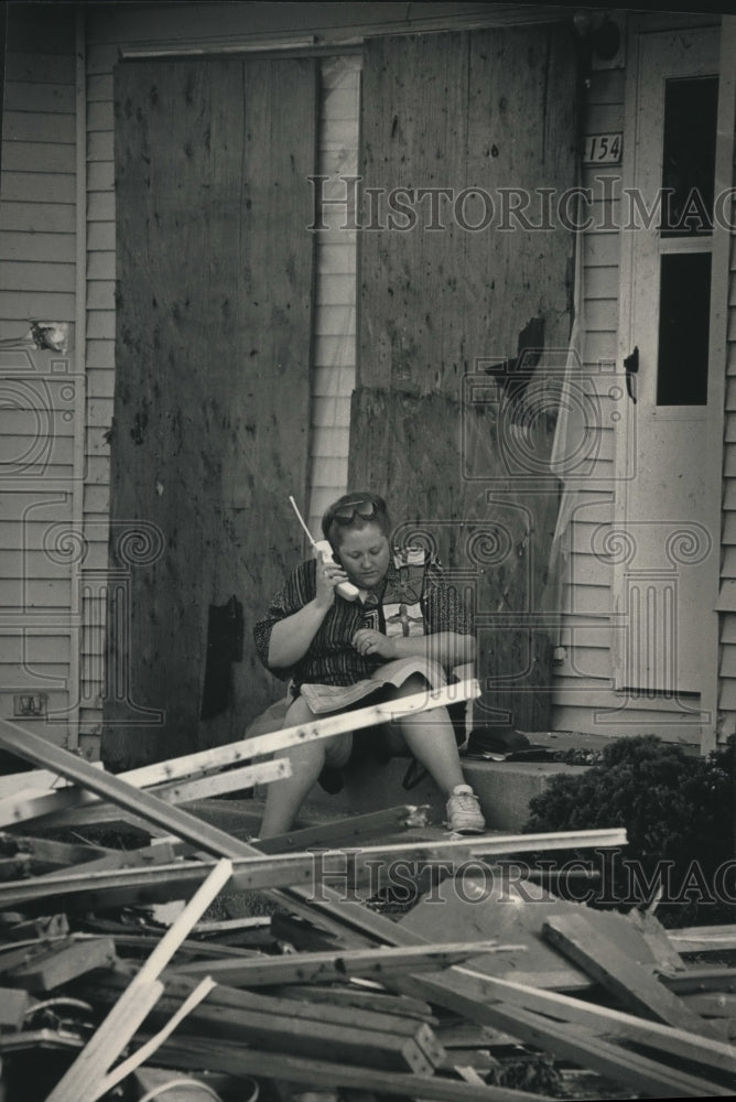 1992, Judy Livings after tornado wrecked her home Dunn, Wisconsin - Historic Images