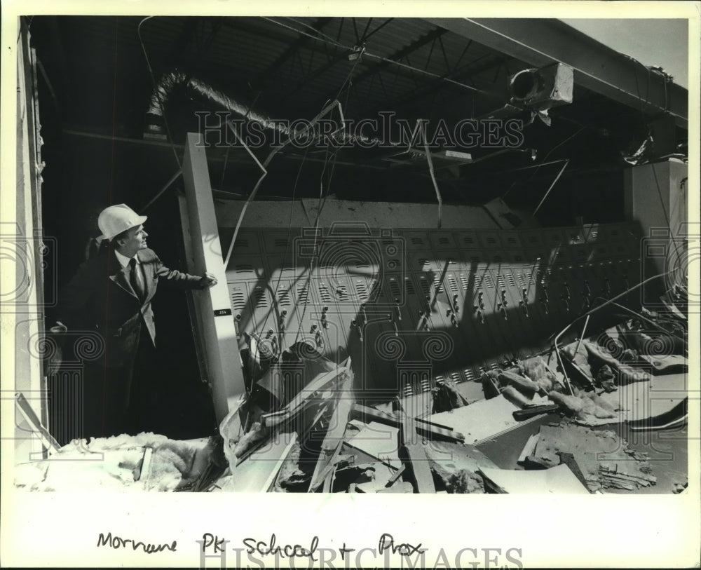 1981 Sen. William Proxmire surveys damage at West Bend school - Historic Images