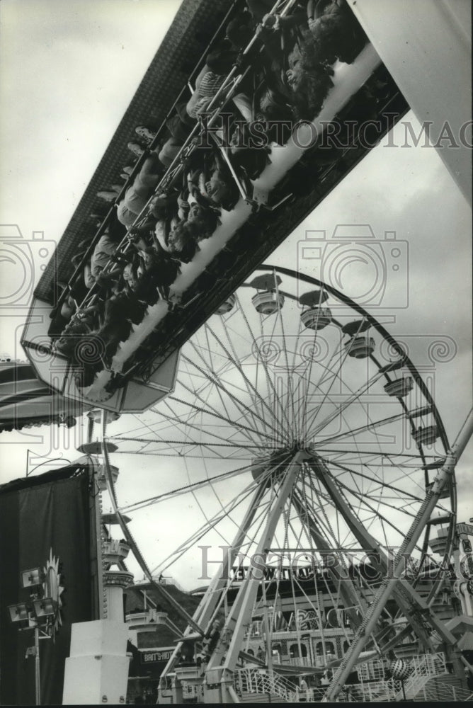 1994 Thrill-seekers on the Space Loop ride at the Summerfest grounds - Historic Images