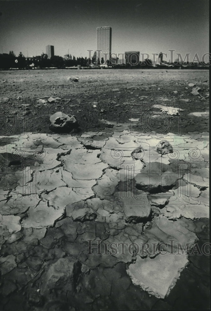 1985, The summer heat has cracked the ground near Summerfest grounds - Historic Images