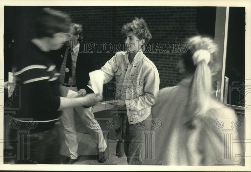 1987, Suzette Droster Distributes Leaflets to Parents in Waukesha - Historic Images