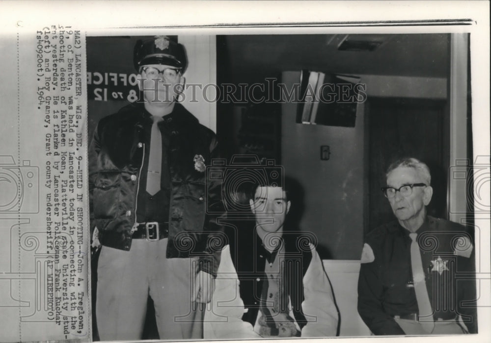 1964, John Treglown, flanked by policemen in Lancaster, Wisconsin - Historic Images