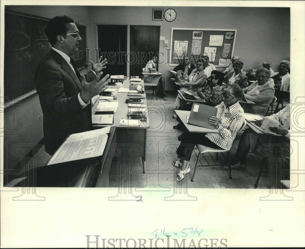 1983, Theodore V. Montgomery Jr., teaches, Cardinal Stritch College - Historic Images