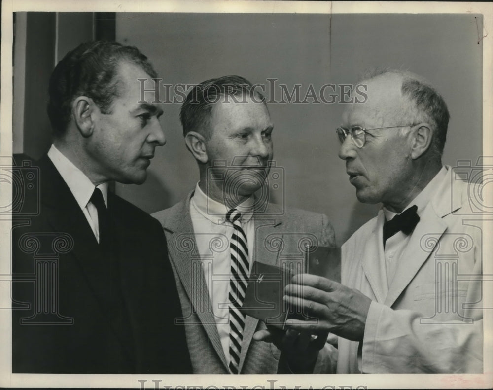 1949, Red Schoendienst talks to Charles Collingwood, Dr. Rene Dubos - Historic Images
