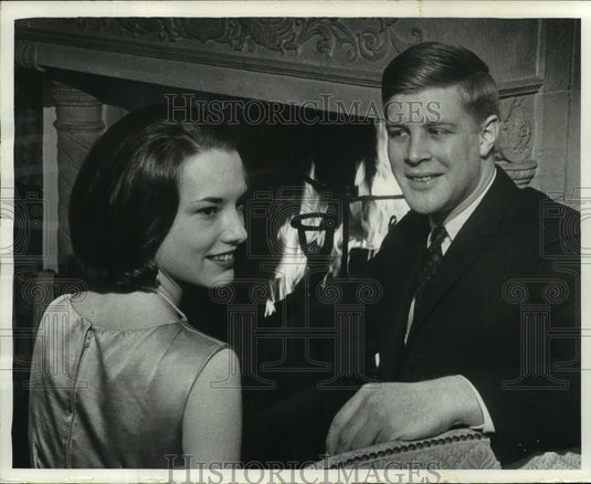 1966, Barbara Anne Abert and John Michael Tooman Sit by Fireplace - Historic Images