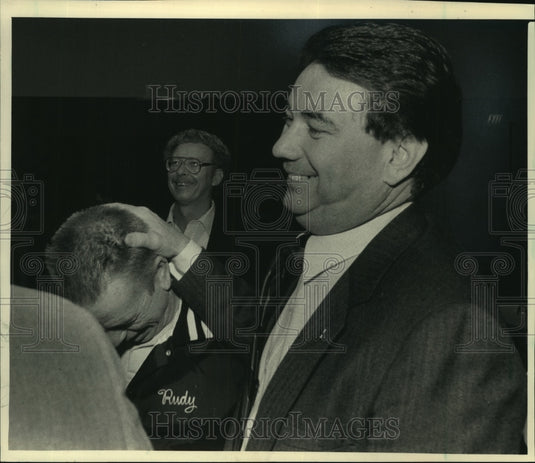 1987, Gov. Tommy Thompson joshes with UAW Local 72 Pres. Rudy Kuzel - Historic Images