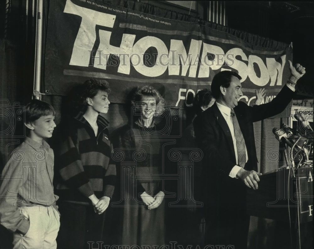 1986, Tommy Thompson with his family announces primary victory - Historic Images