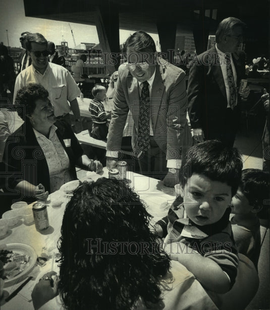 1992 Gov. Tommy Thompson visits picnic at War Memorial Center - Historic Images
