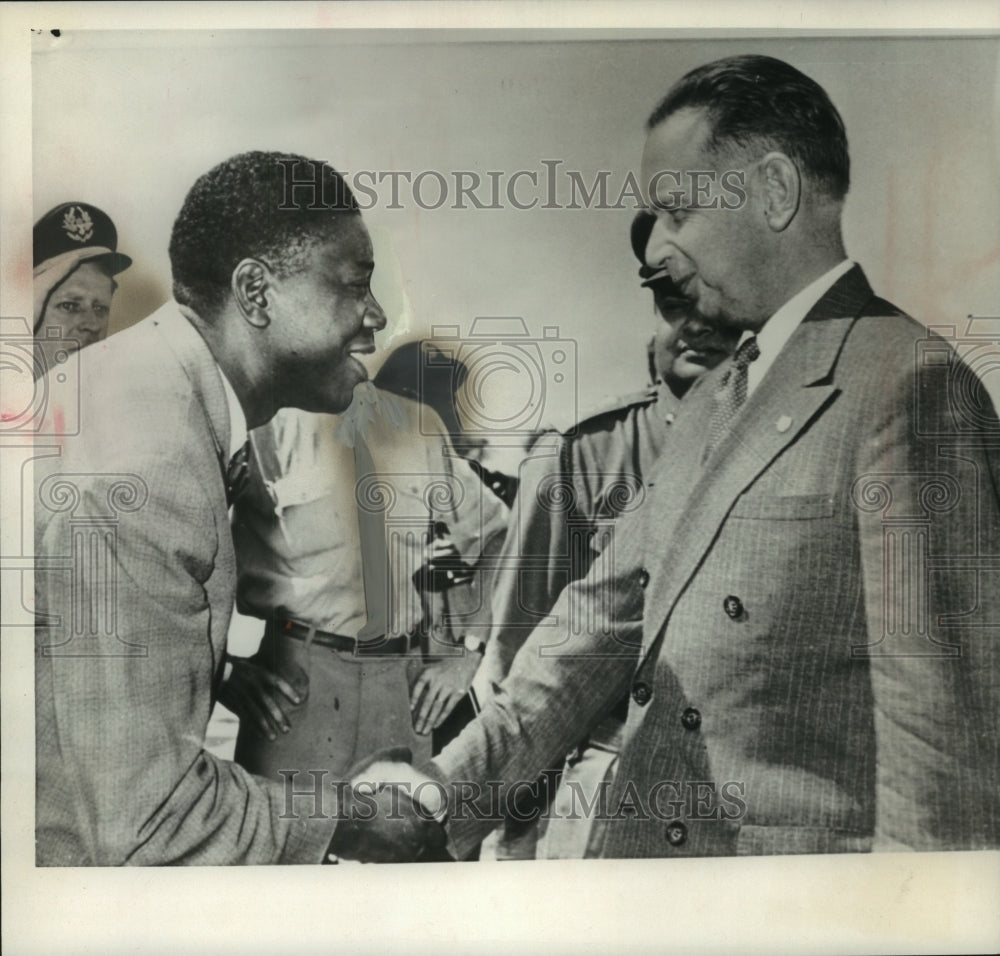 1961, Dag Hammarskjold and Tshombe shake hands - mjc12053 - Historic Images