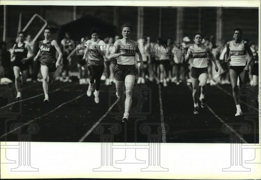 1993 Waukesha Catholic Memorail's Karen Scherwinski in 400 meter run - Historic Images