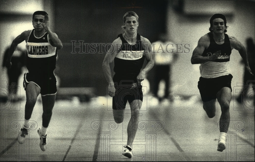 1991 Press Photo High school track runners at the Metro Conference indoor meet - Historic Images
