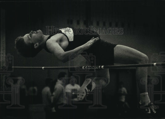 1991 High school track & field high jumper, Brad Beyer Jr. in action - Historic Images