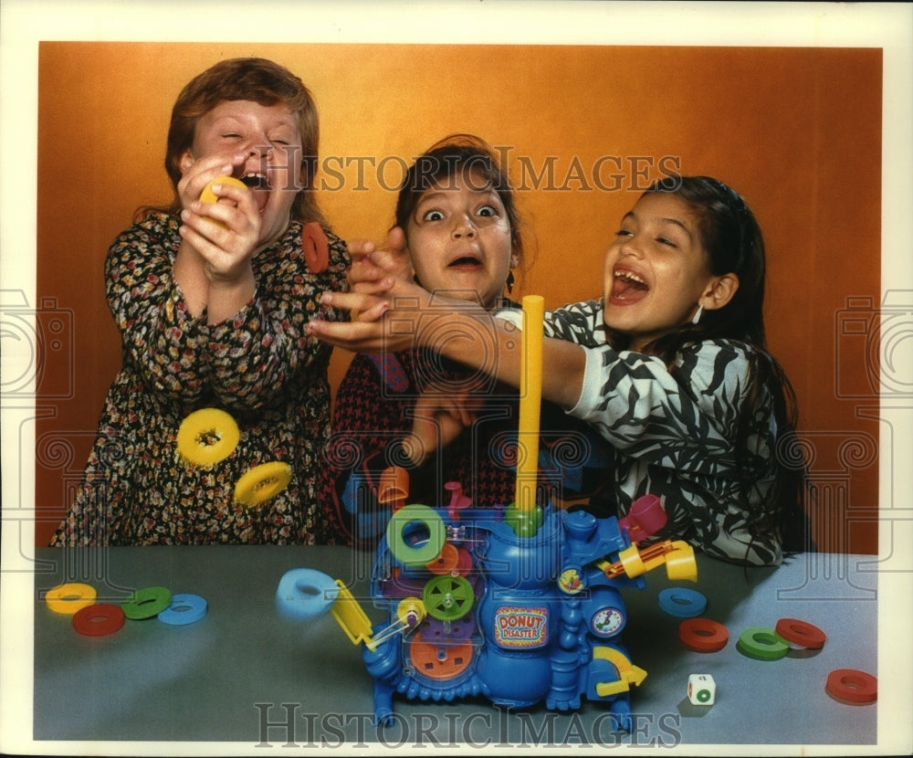 1993 Press Photo Children play with the Donut Disaster toy machine - mjc12213 - Historic Images