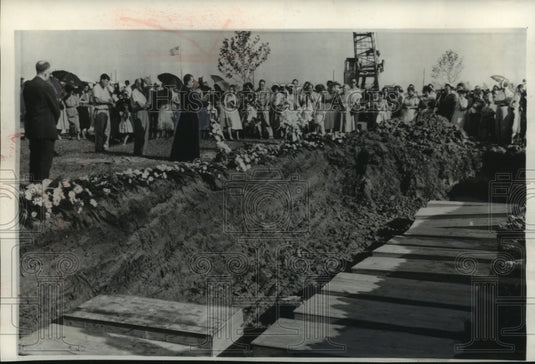 1957, Victims of hurricane Audrey are buried in a mass grave - Historic Images