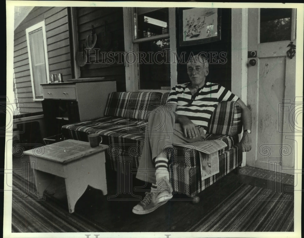 1983 Nobel Prize winner and Professor James Tobin on his porch - Historic Images