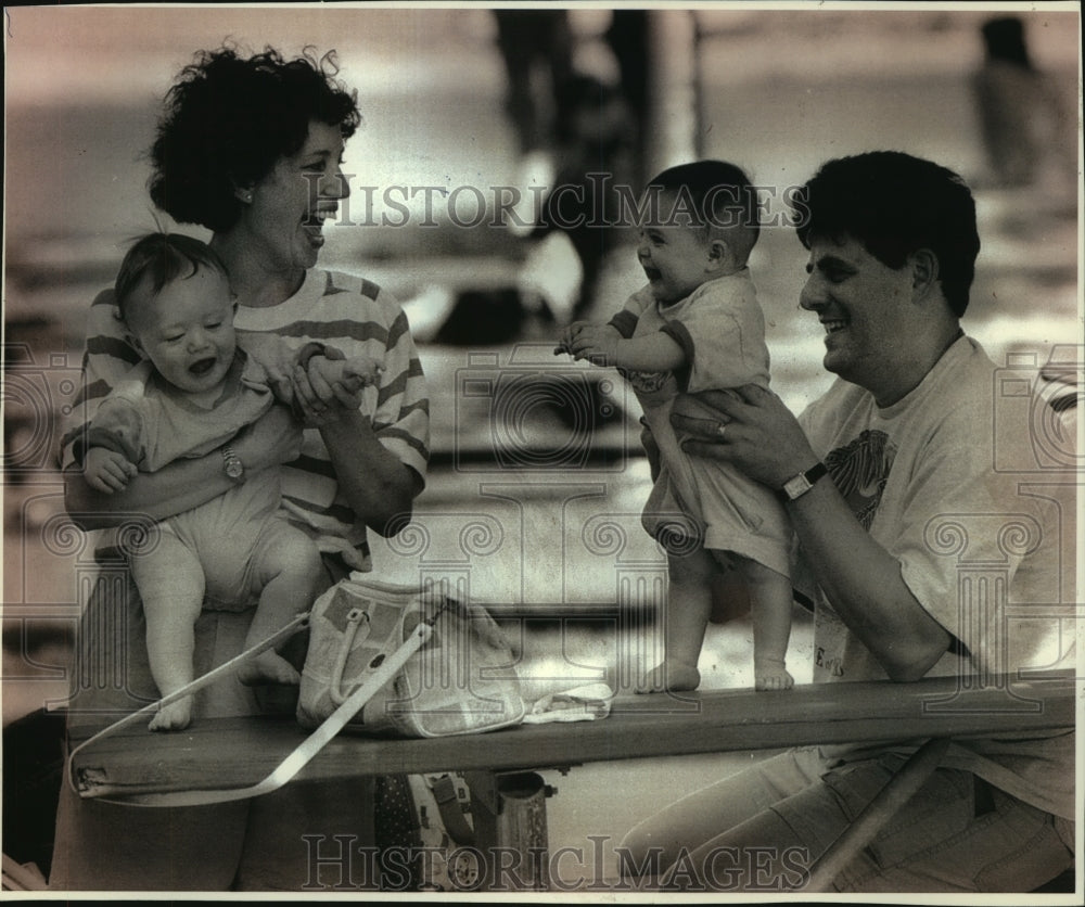 1993 Lori, Howard, kids, Waukegan, Illinois, enjoying Summerfest - Historic Images