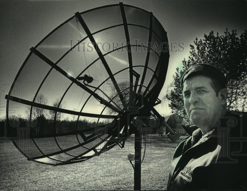 1985, Donald Voigt, next to 12-foot mesh dish antenna, Cedarburg - Historic Images