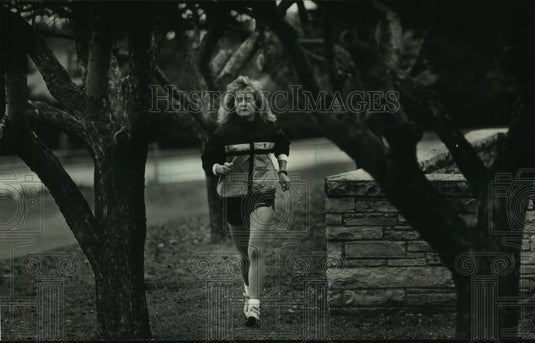 1989 Lisa Tolbert, of South Girls' cross country team, running. - Historic Images