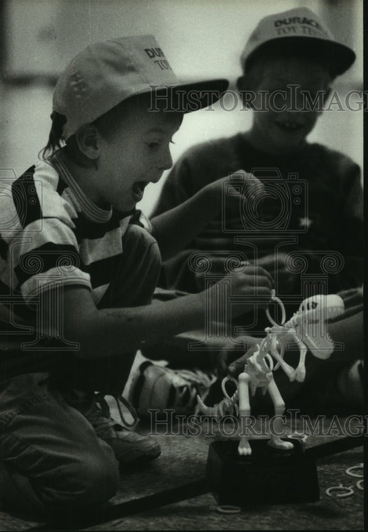 1993 Danny Benz and Chris Norton try out new toy in Germantown - Historic Images