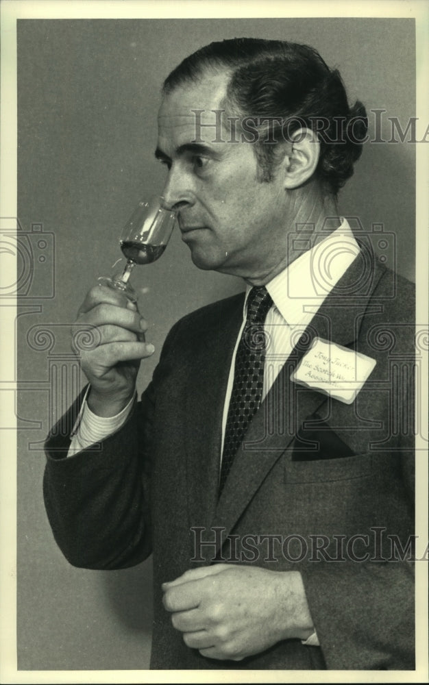 1987, Tony Tucker nosed a glass of scotch at Milwaukee Hyatt Regency - Historic Images